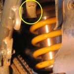 Airbox vent-tube cover damaged  by chain.